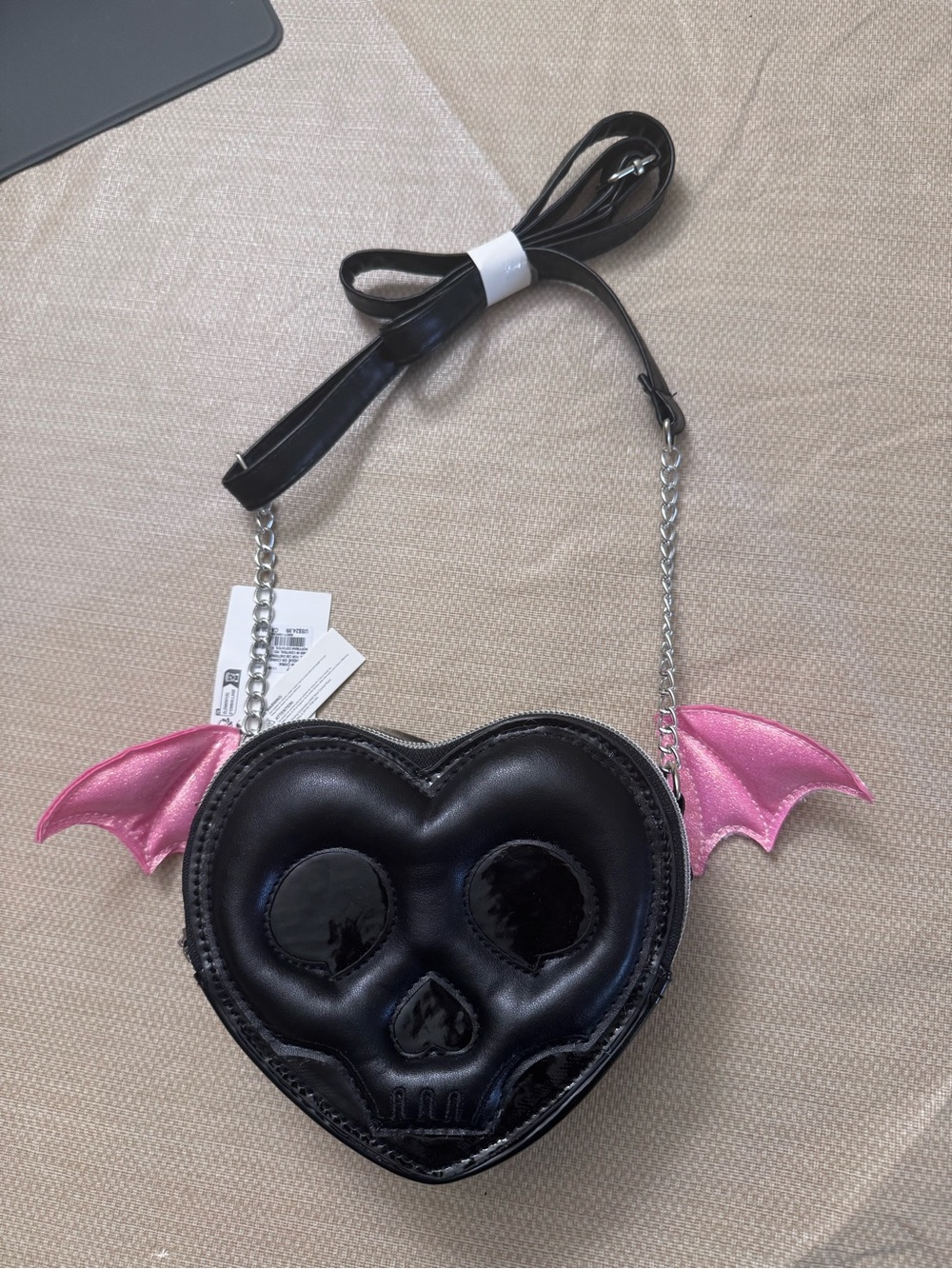 YRU Black Heart Skull Crossbody with Pink Wing Accents